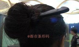 اقدام عجیب یک زن در فرودگاه+ تصاویر  زن چینی