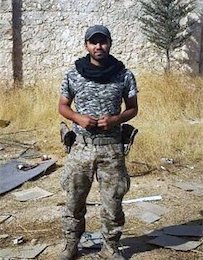 سنگ گذاری بر مزار شهید مدافع حرم/عکس شهید محمدرضا دهقان امیری