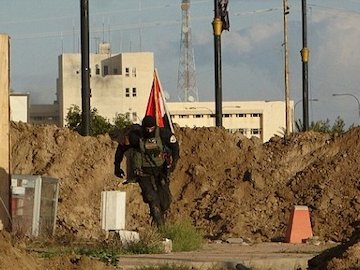 جنازه داعشیها خوراک سگها شد+عکس (۱۶+)  رمادی